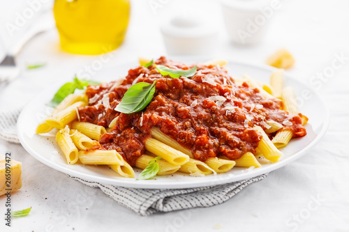 Photography Bolognese penne pasta served on plate