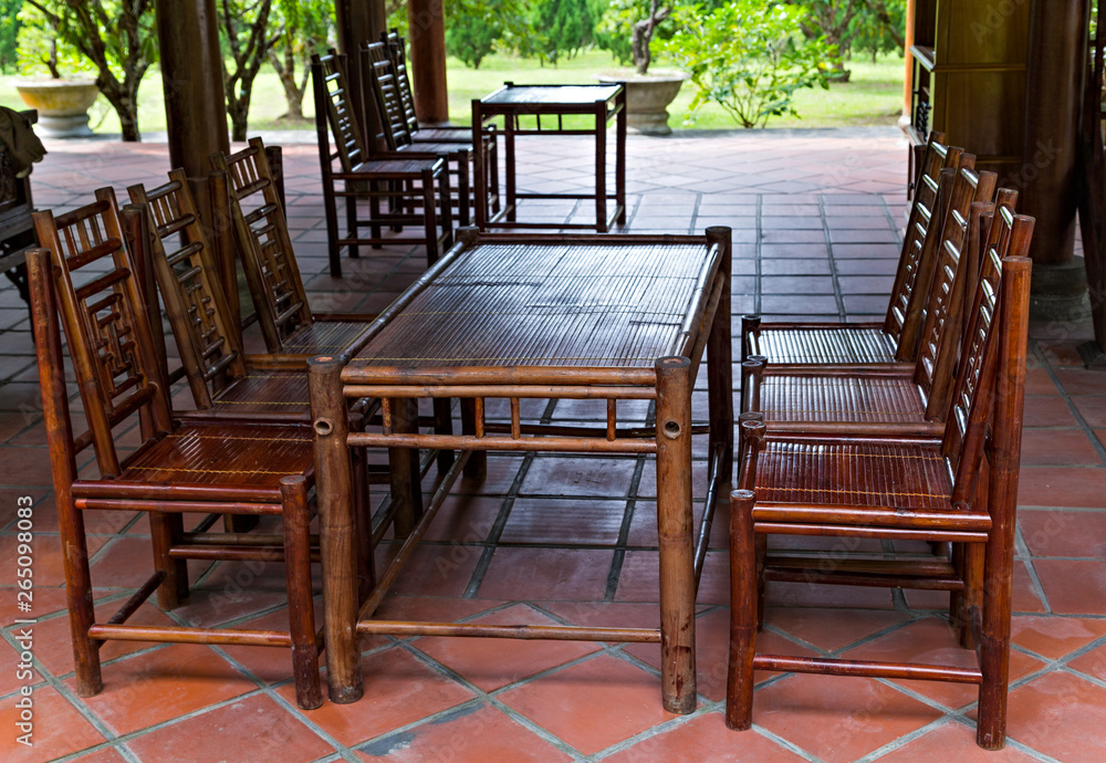 Cafe restaurant resort terrace with wooden chairs and table