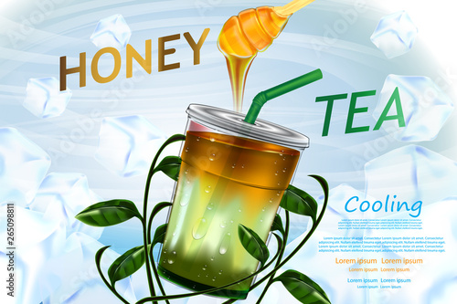Honey and Tea in Cup on tea leaves in ice cubes background.