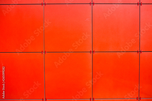 Arrangement of ventilated facade. Red ceramic tiles for the facade. © Larisa