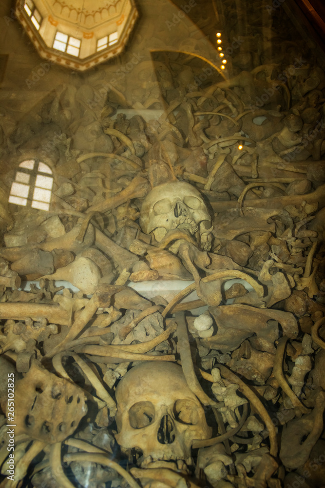 Human skulls and bones in the Ossuary. Martyrs of Otranto Cathedral (Apulia),Italy.