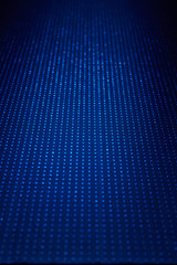In the white point of the blue background with the transition from partial blur to full