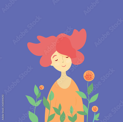 Redhead girl and spring blossom.