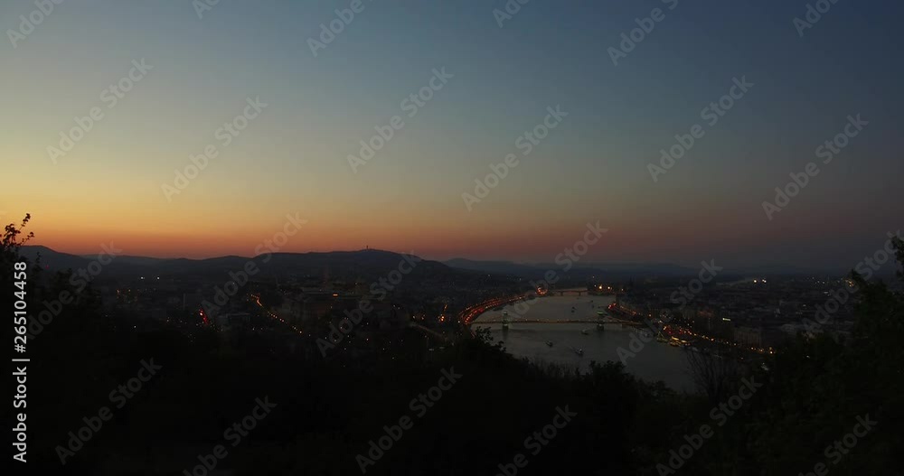 View of the Buda Castle Hill and Danube river area from the Gellert Hill at twilight. View of the Buda Castle Hill and Danube river area from the Gellert Hill at twilight.