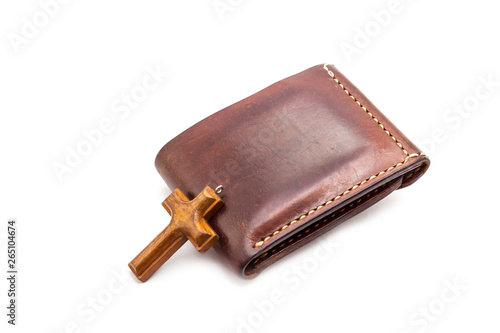 Wallet with a wooden crucifix photo