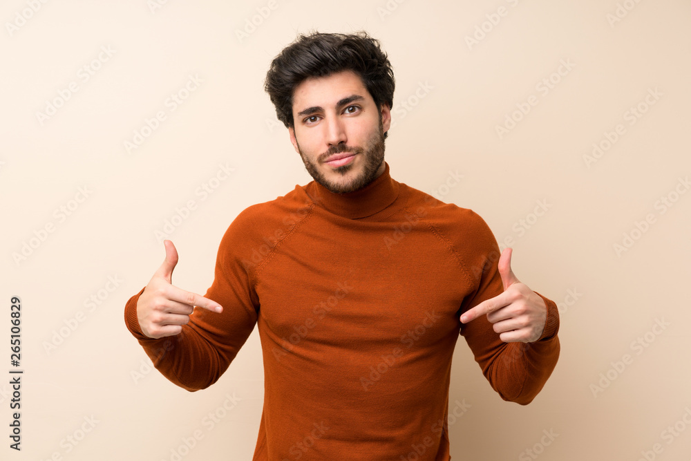 Handsome over isolated wall proud and self-satisfied Handsome over isolated wall proud and self-satisfied