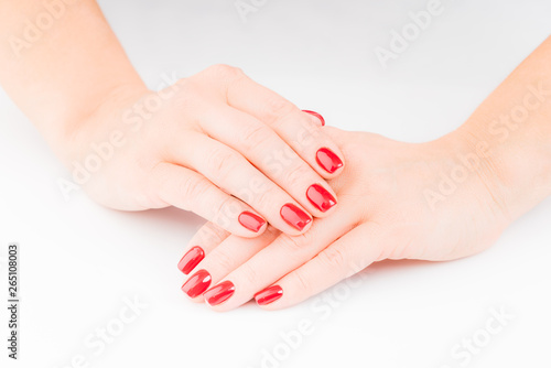 Stylish trendy female manicure. red manicure nails