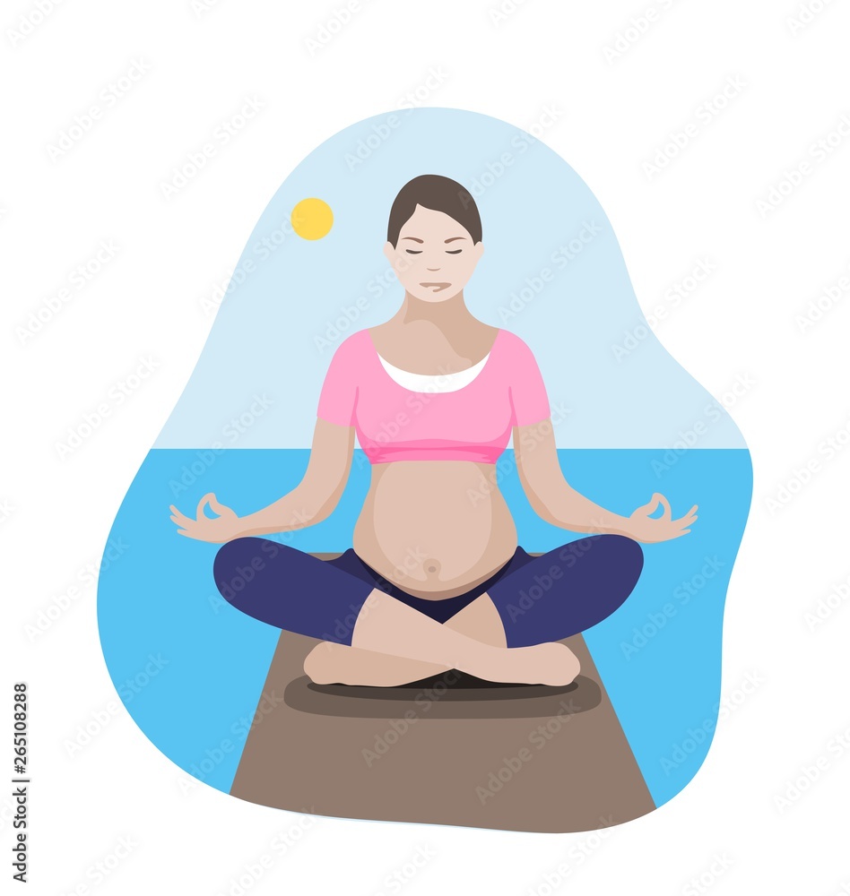 Pregnant mother relaxing in yoga lotus pose on the shore at the sea