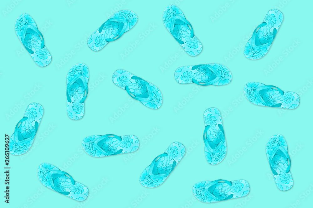 Flip flops on blue background, summer pattern Flip flops on blue background, summer pattern