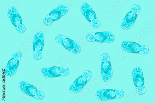 Flip flops on blue background, summer pattern