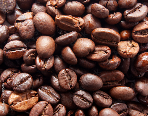Brown coffee beans, close-up of coffee beans for background and texture