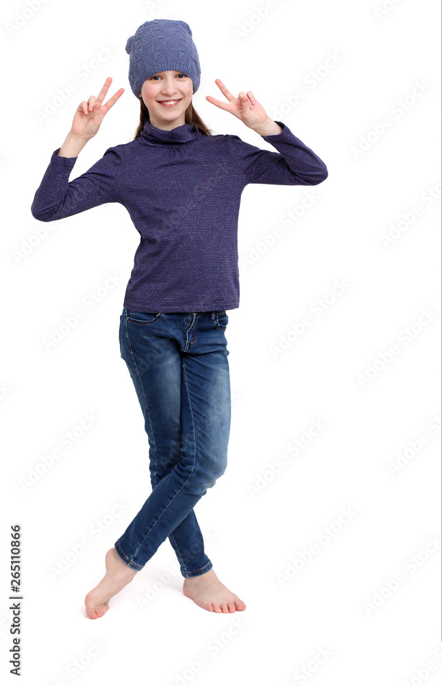 Happy young teenager girl showing victory sign Happy young teenager girl showing victory sign