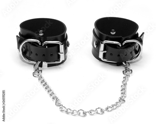BDSM leather bracelets on the arm. Isolated on white background
