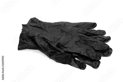 Two black rubber gloves isolated on white surface
