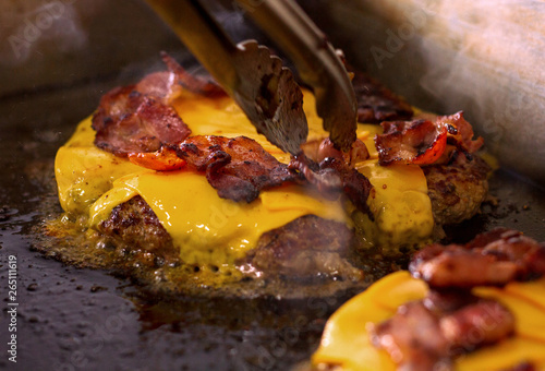 Beef grill cooking process meat patties with beef or pork cheese and bacon for burgers