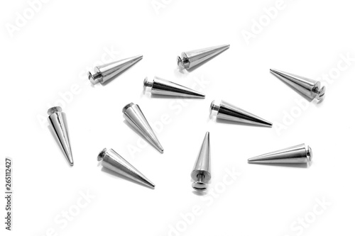 Silver metal spikes isolated on white background