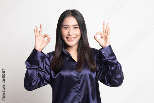 Asian woman show double OK hand sign and smile.