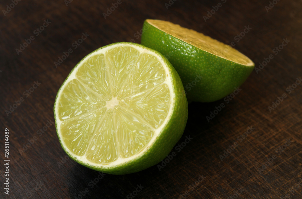 Lime on a wooden background. Close up Lime on a wooden background. Close up