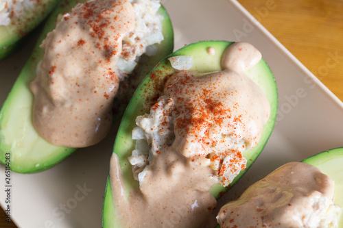 Avodado, tuna and mayonaise appetizer meal close up photo