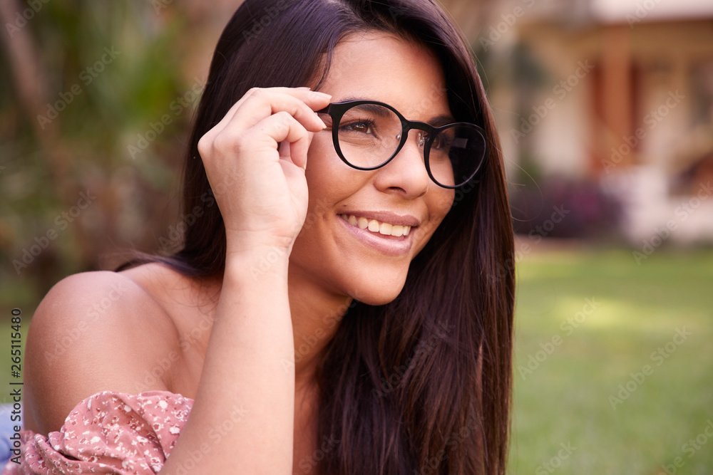 Beautiful brunette in spectacles, looking away Beautiful brunette in spectacles, looking away