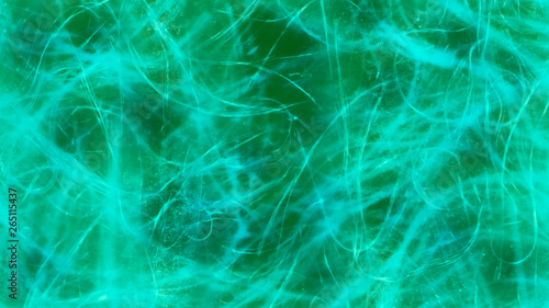 abstract texture,turquoise stains,blots,splashes,green background for design solutions.