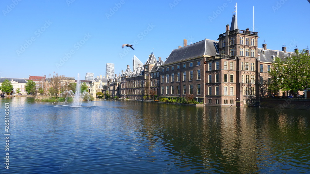 View to the historical Binnenhof with the Hofvijver lake by day in The Hague, Netherland