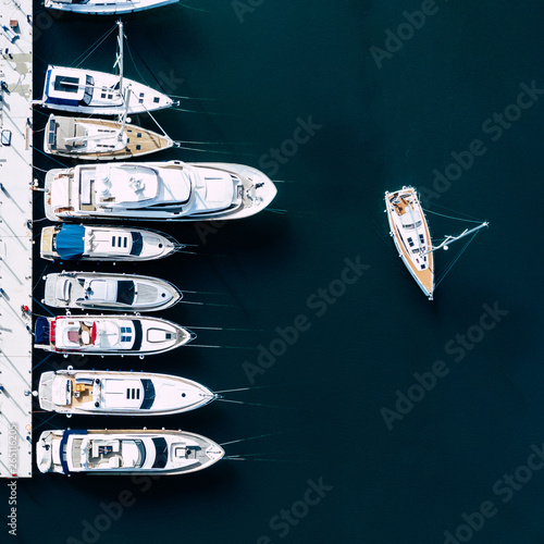 Aerial View of Yacht Club and Marina. White Boats and Yachts. Photo made by drone from above. © Curioso.Photography