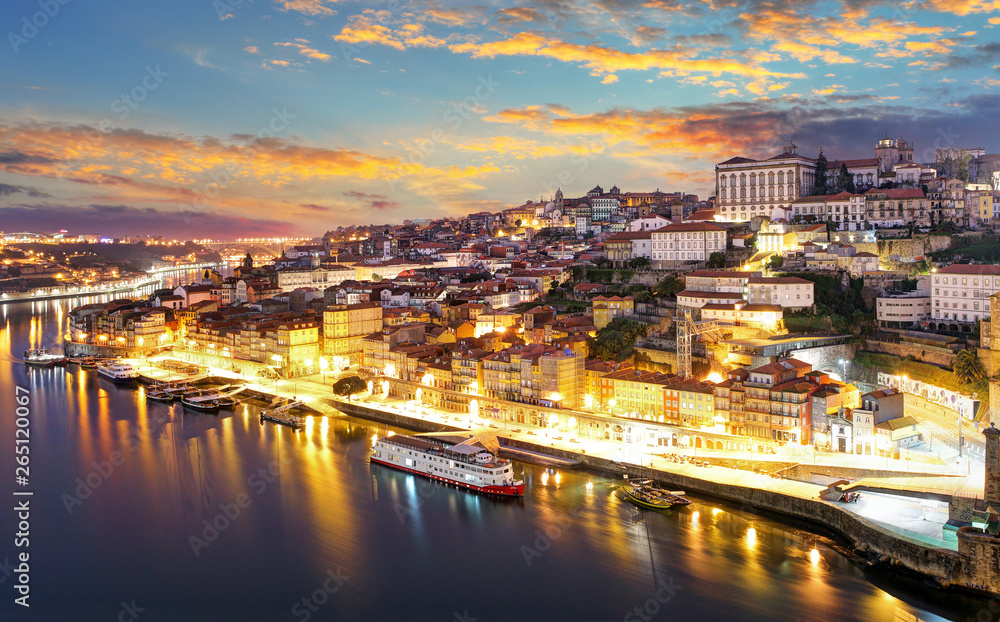  Porto at twilight with reflection in Douro river. Portugal