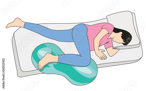 Pregnant woman in Pregnancy labor position w peanut ball on bed