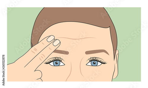 Woman using fingers to show onset of wrinkles and aging