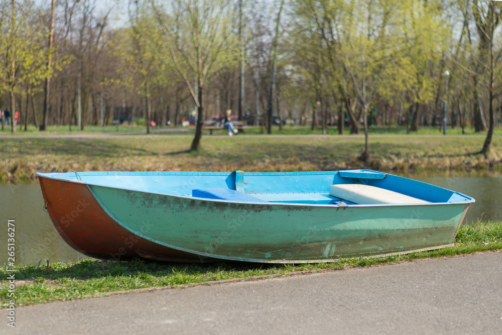 Old boat on the shore near the lake. Old boat on the shore near the lake.