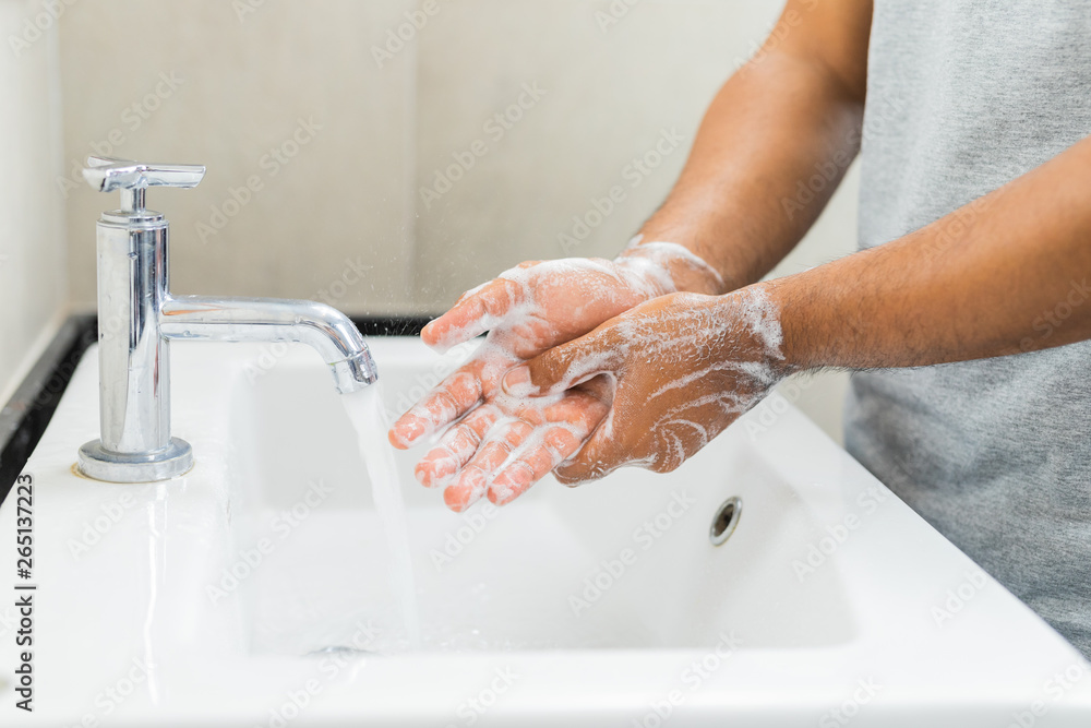 Man washing hands with soap. - obrazy, fototapety, plakaty 