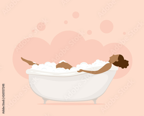 Woman in Bathtub in Pink Bathroom