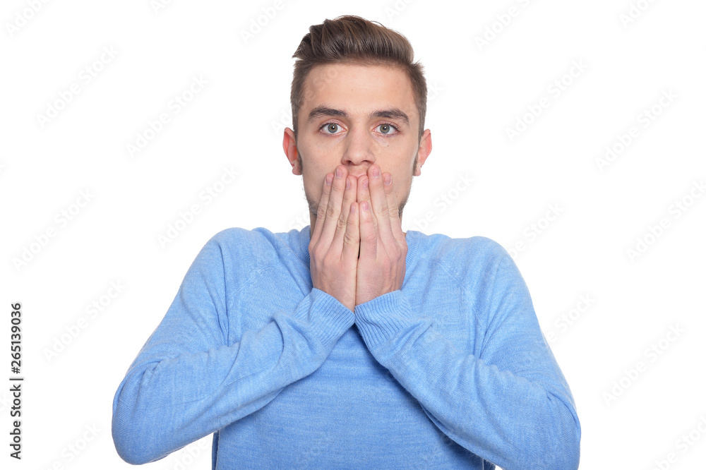 Handsome young man posing isolated on white background