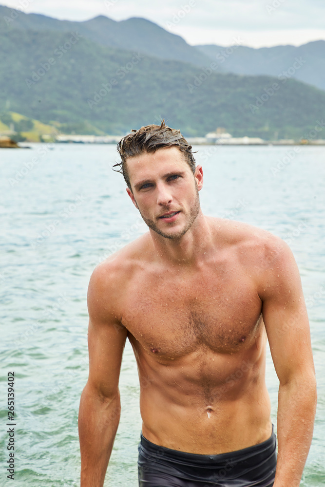 Handsome guy emerging from sea, portrait Handsome guy emerging from sea, portrait