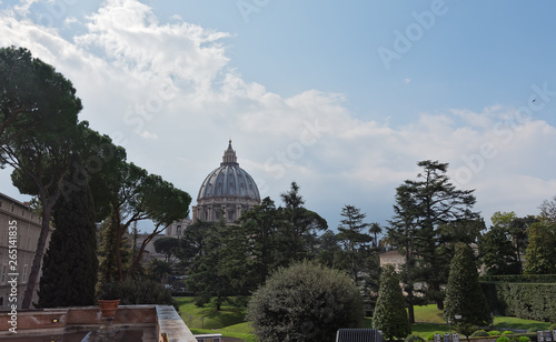 VATICAN - march, 2019: Vatican gardens view with St. Peter's Basilica dome behind the trees, Vatican, Rome