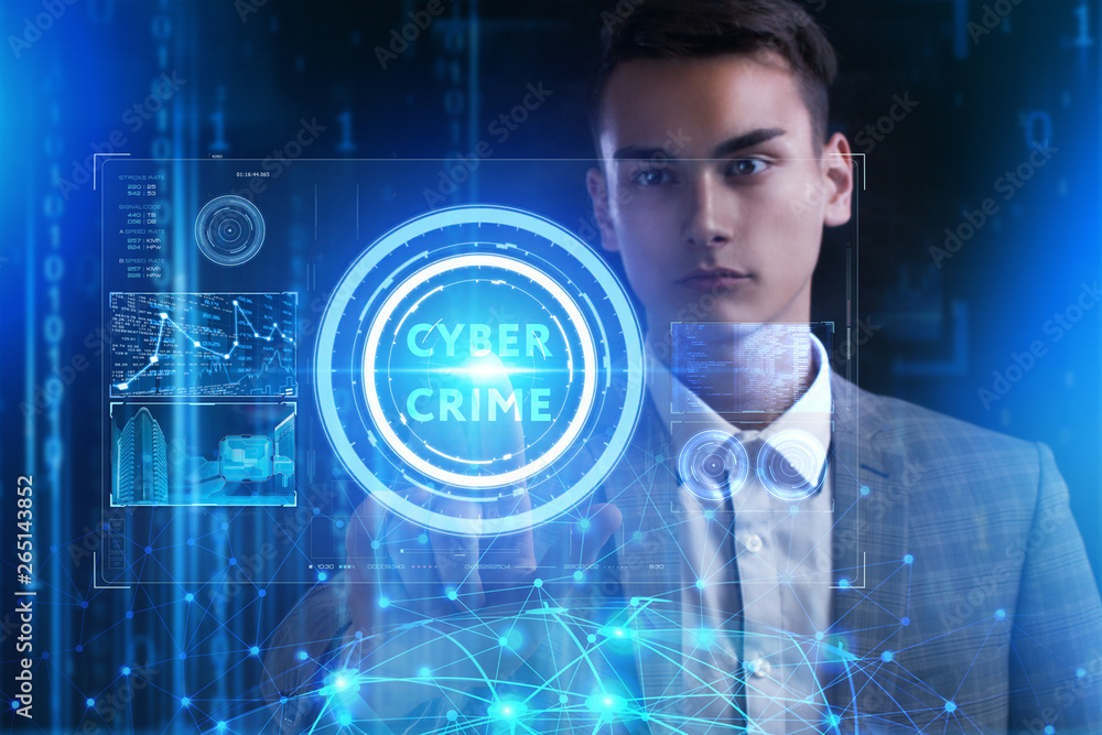 The concept of business, technology, the Internet and the network. A young entrepreneur working on a virtual screen of the future and sees the inscription: Cyber crime The concept of business, technology, the Internet and the network. A young entrepreneur working on a virtual screen of the future and sees the inscription: Cyber crime
