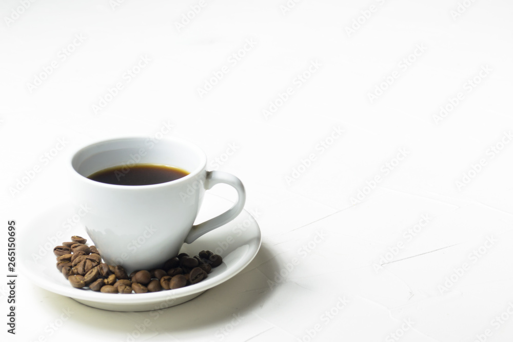 Coffee cup and coffee beans on wooden background. Top view. Coffee cup and coffee beans on wooden background. Top view.