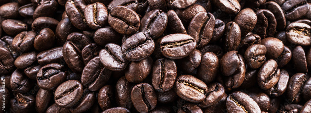 Roasted coffee beans. Food and drink background. Top view. Roasted coffee beans. Food and drink background. Top view.