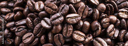 Roasted coffee beans. Food and drink background. Top view.