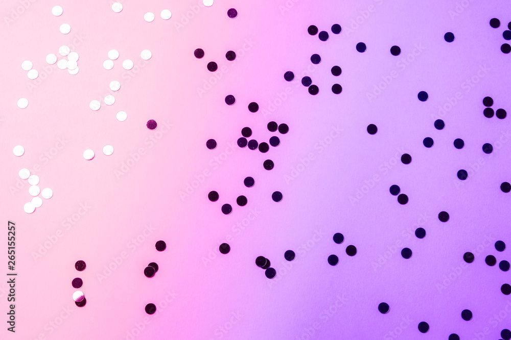 Sparkling confetti on pink purple pastel background