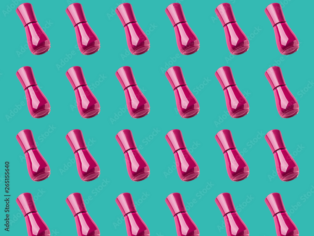 Dark pink nail polish bottle flat pattern on green background Dark pink nail polish bottle flat pattern on green background