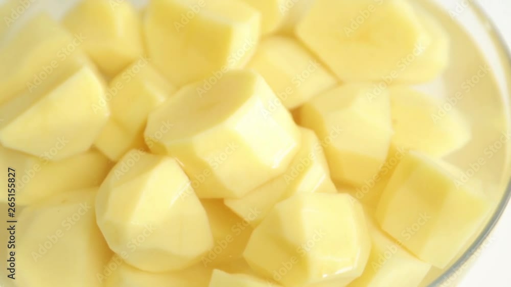 Cooking for a cooking blog. Washing peeled potatoes and immersion in water. Cooking for a cooking blog. Washing peeled potatoes and immersion in water.