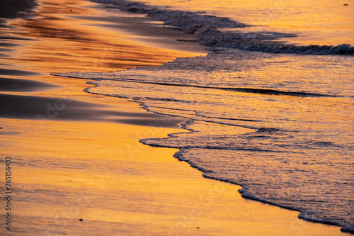 The golden beach in sunrise