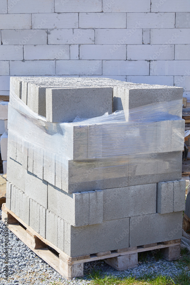 Concrete block bricks in stack for wall construction. Concrete block