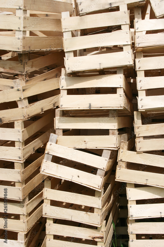 A lot of wooden crates for storage of fruit or vegetables A lot of wooden crates for storage of fruit or vegetables
