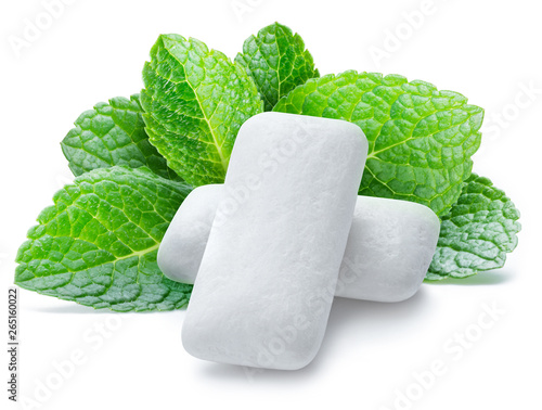 Chewing gum pads with mint leaves isolated on white background. photo
