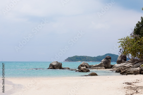 Tropical white sand sea coast beach with blue water