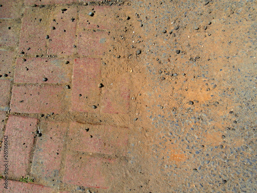 Messy clobestone road. Dusty red color tones.