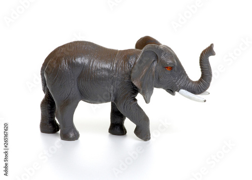 Toy plastic elephant isolated on white © Alekss